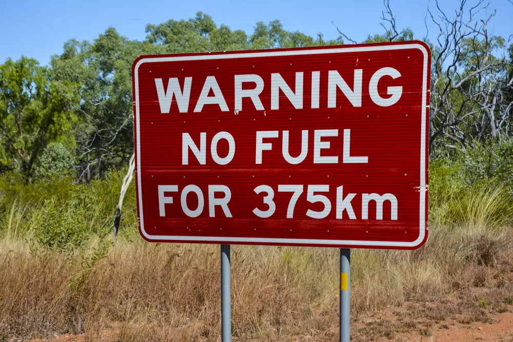 Sign warning remote travellers there is no more fuel for 375kms
