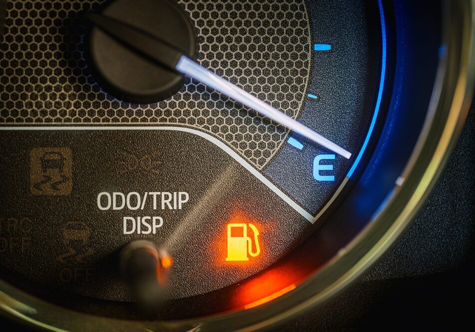 Low Fuel Warning Light on car Dashboard