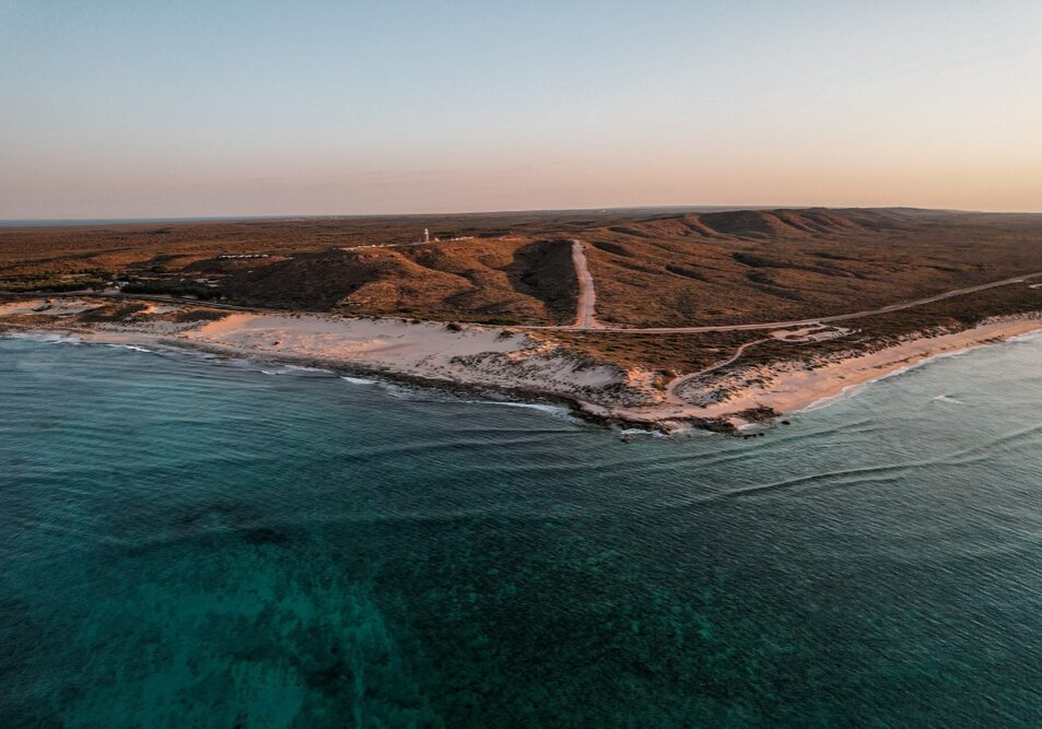 Aerial,Picture,Of,A,Sunset,Over,The,Lighthouse,In,Exmouth,