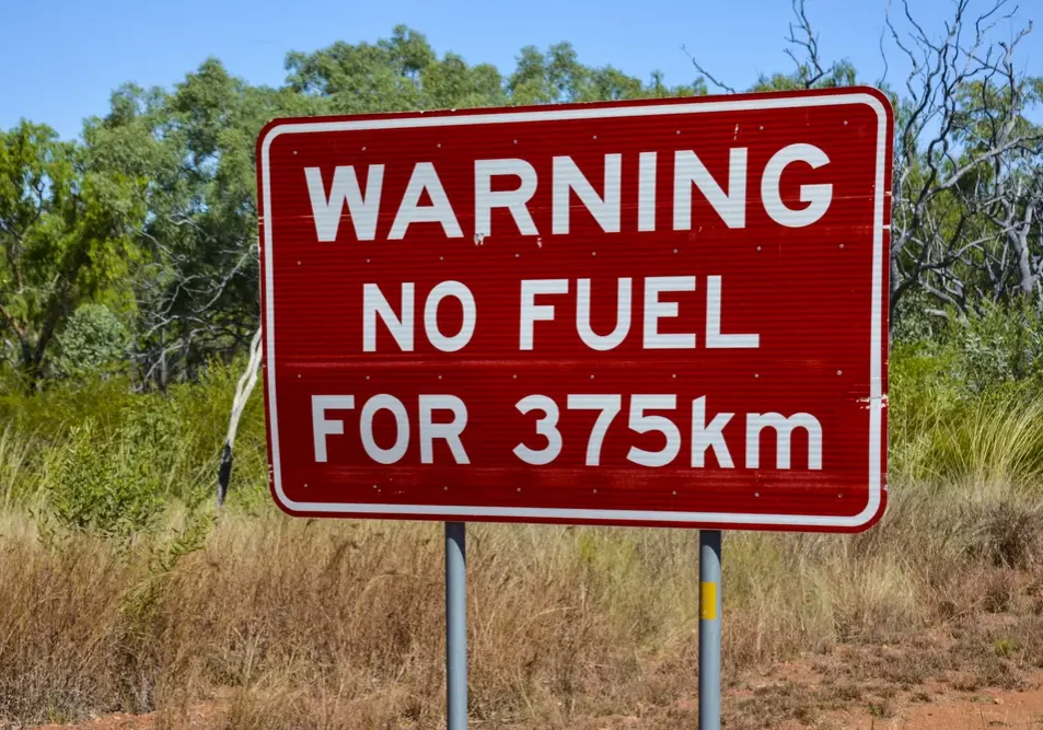 Sign warning remote travellers there is no more fuel for 375kms